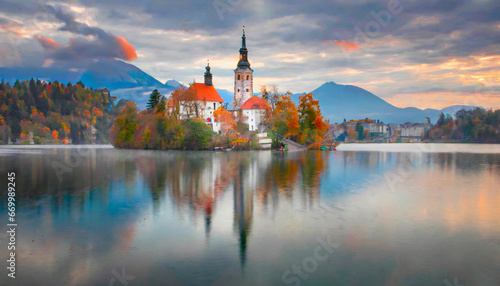 attractive morning view of pilgrimage church of assumption of maria impressive autumn scene of bled lake julian alps slovenia europe traveling concept background