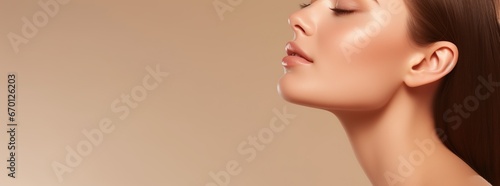 Beautiful young woman with clean fresh skin on beige background, Facial care, Facial care, Cosmetology, beauty