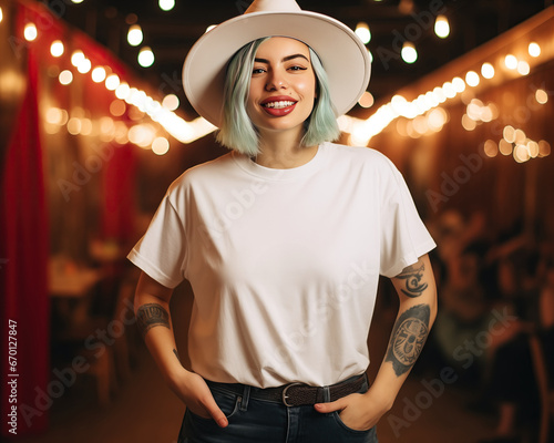 tshirt mock up cowgirl:: A curvy hipster alternative woman with tattoos, green hair wears a cowboy hat in a saloon bar. A blank white t shirt mockup. Disco cowgirl bachelorette aesthetic