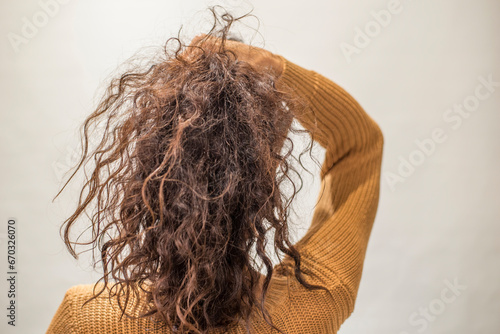 woman with long curly hair