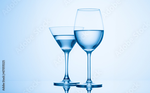 Refreshing drink in elegant stemware with reflective properties.