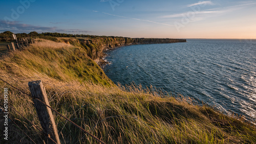View of Pointe du Hoc in French Normandy at sunset.