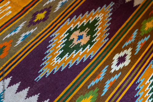 Old woolen carpet with traditional Karelian pattern