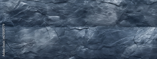 Stones texture and background. Rock texture with cracks. Gray stone background. Wide panoramic banner.