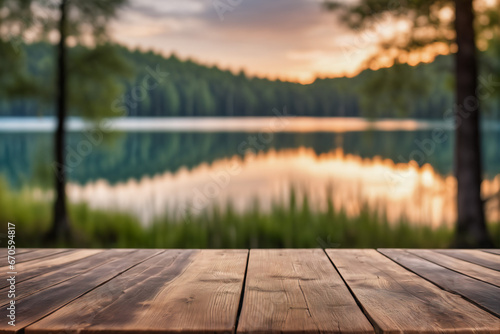 Empty Wooden Table with Lake and Forest Background at Dawn or Dusk