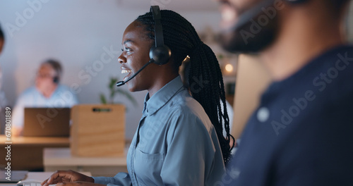 Happy woman, call center and night communication, customer service or e commerce support on computer. Professional consultant or african agent of web solution, questions or business chat in workspace