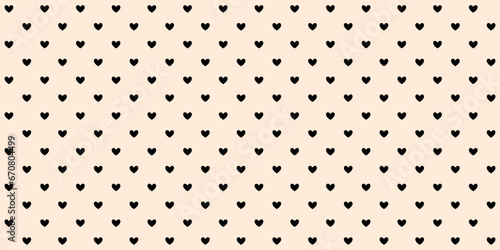 Black hearts seamless pattern on beige background. Valentines polka dot repeating wallpaper. Heart-shaped decorative texture for textile, fabric, cover, poster, banner, print, card. Vector backdrop