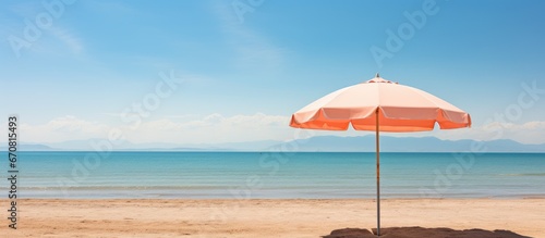 Beach in Florian polis Brazil with sand and an umbrella