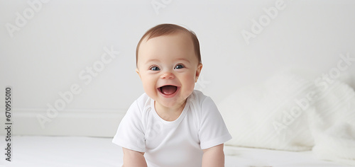 Portrait of a happy baby with Down syndrome.