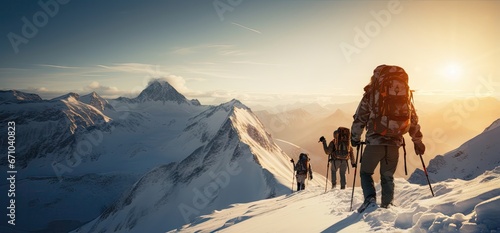 expedition of mountaineers on the mountain ridges all snowy and well equipped, winter concept