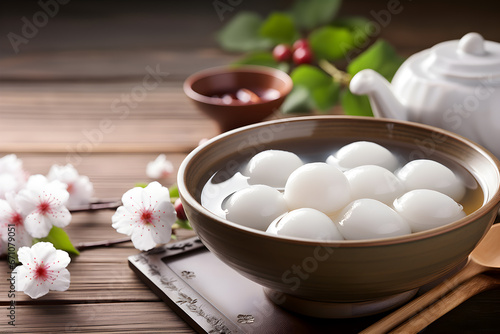 Tangyuan, A traditional Chinese dessert, Glutinous rice balls served in a hot broth or syrup in a bowl Sweet food of Lantern festival, Dongzhi (winter solstice) festival and Chinese new year 