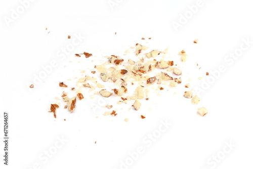 Ground, milled, crushed or granulated almonds.Crushed almonds isolated on white background closeup. Grated almond seeds.