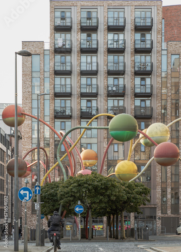 The penelope sculpture at Wolstenholme square's famous at Gradwell Street,Abstract of different coloured spheres at the end of poles twisting at different heights and directions, Merseyside,Copy space