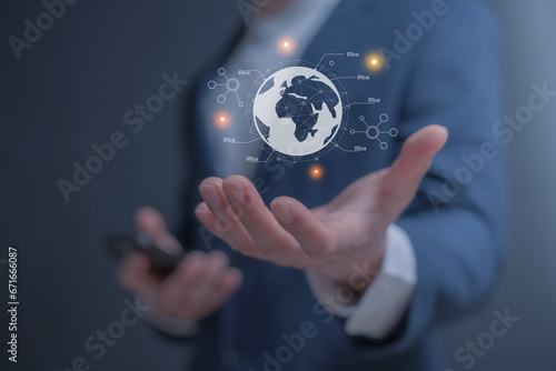 hand holding globe holographic to show ideas to export and logistic around the world to scale his business to global 