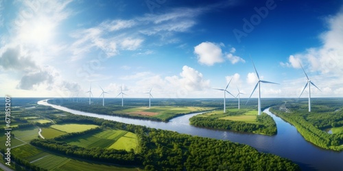 Drone Captures Vast Country Views with Wind Farms and a Meandering River, Showcasing the Beauty of Renewable Energy and Nature's Harmony