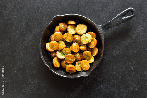 Roasted potatoes in frying pan