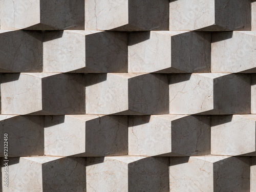 Architecture external wall detail, cube design and geometric pattern. Concept for construction, modern building, geometry, abstract, shadows and light. 