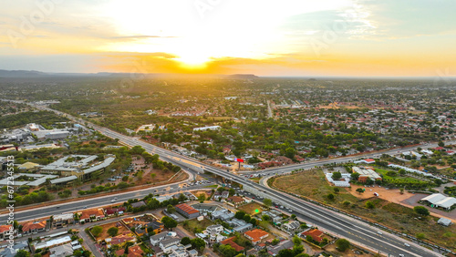 Sunset over Gaborone with the Mass Media Complex overpass in view, Botswana, Africa