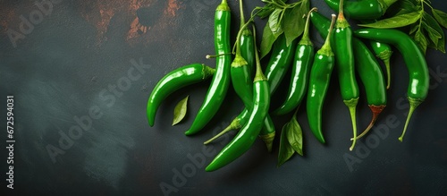 Serrano Peppers with an organic green spicy flavor featured against a backdrop