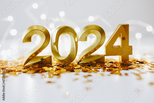 happy new year 2024 background. New year holidays card with bright lights and golden confetti on white background