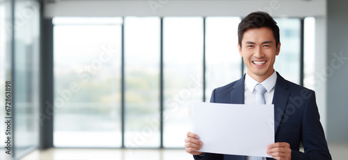 Happy smile businessman, holding a white sheet of paper on the office building, a white business professional. Generative AI.