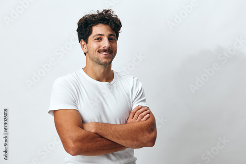 Man lifestyle portrait hipster serious t-shirt isolated person white background american smile confident fashion
