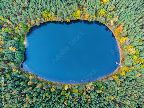 Aerial view of a lake in the forests of Lithuania, wild nature. The name of the lake is "Kuleinis", Varena district, Europe.