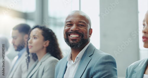 Portrait, group and black man in a workshop, business and conference with planning, feedback and listening. Face, African person and employee in a meeting, staff and employee with seminar and review