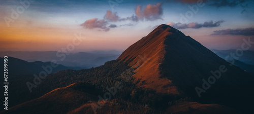 sunset in the mountains,the beautiful mountain and sky,landscapes