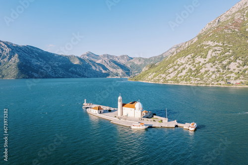 Church of Our Lady of the Rocks on the island of Gospa od Skrpjela. Bay of Kotor, Montenegro. Drone