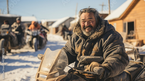 man sitting on an atv in a northern village