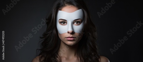Caucasian lady with a displeased expression wearing a mask as a symbol or representation