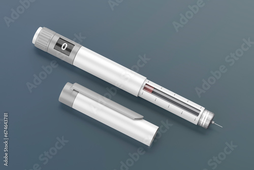 White insulin injector pen on dark background