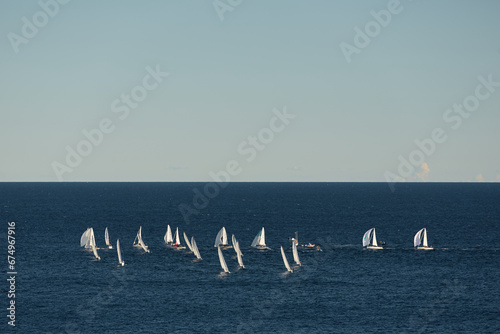 A lot of sail boats and yachts in the sea went on a sailing trip near port Hercules in Monaco, Monte Carlo, sail regatta, race