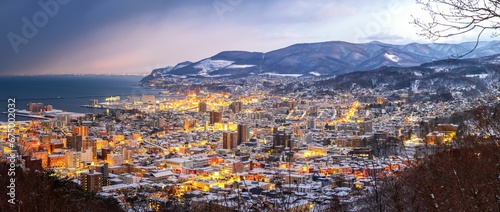 Panoramic view of Otaru with evening illumination. Hokkaido, Japan.