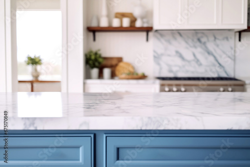 Blue modern kitchen interior with white marble countertop and flower on vase. High quality photo