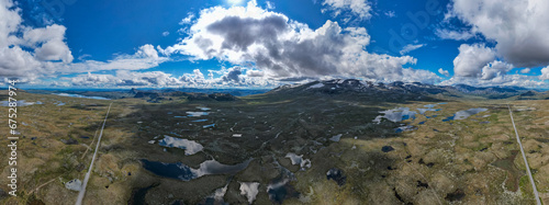 Aerial view above Jotunheimen Norway - Glacier fed lakes in the highlands and valleys of Central Norway