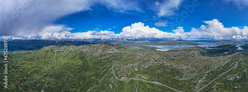 Aerial view above Jotunheimen Norway - Glacier fed lakes in the highlands and valleys of Central Norway 