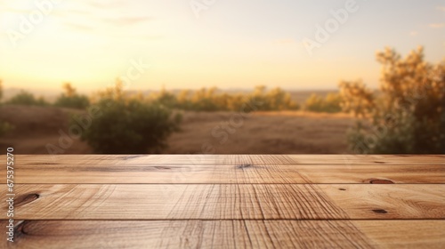 A wooden table top with a blurry background