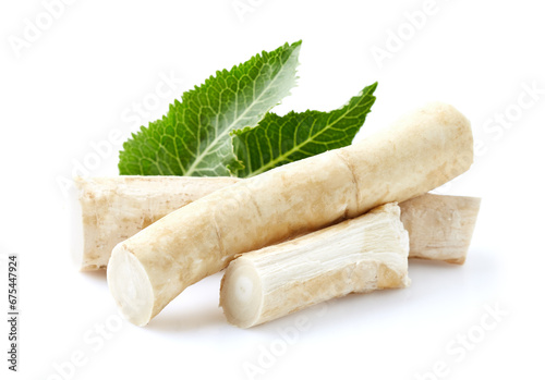 Horseradish root in closeup on white background