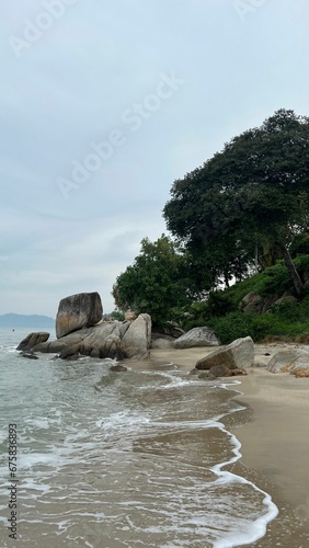 Large rocks on a sandy beach