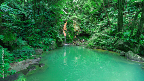 Hot thermal water pools in the Caldeira Velha natural monument on the Portuguese island of São Miguel in the Azores