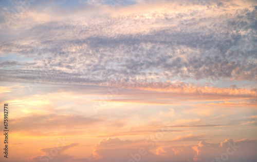 blue sky with clouds, pink yellow sun sunset, background