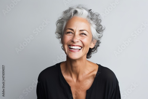 Elegant Senior Woman with Gray Hair in Black Blouse