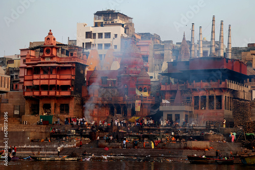 View of the ceremony of the cremation of a unknown Hindu person at Manikarnika Ghat front the Ganges river in Varanasi India