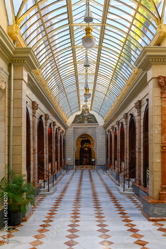Courtyard with glass ceiling. Architecture in Casino of Murcia (1853), Spain