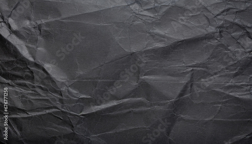 black crumpled paper texture blank dark background with creases generative ai