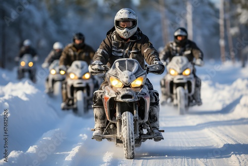 Group of snowmobilers riding in a convoy on a snow-covered trail through a serene forest, with the lead rider approaching the camera