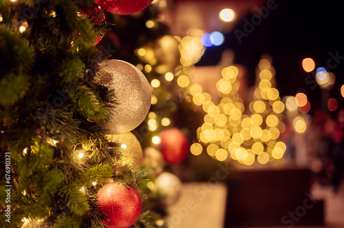 Christmas background with bokeh, Christmas trees and decorations, soft focus, space for text