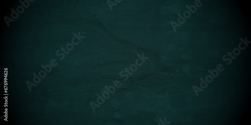 Stone green wall texture grunge rock surface. dark gray concrete background backdrop. wide panoramic banner. old wall stone for dark green distressed grunge background wallpaper rough concrete wall.